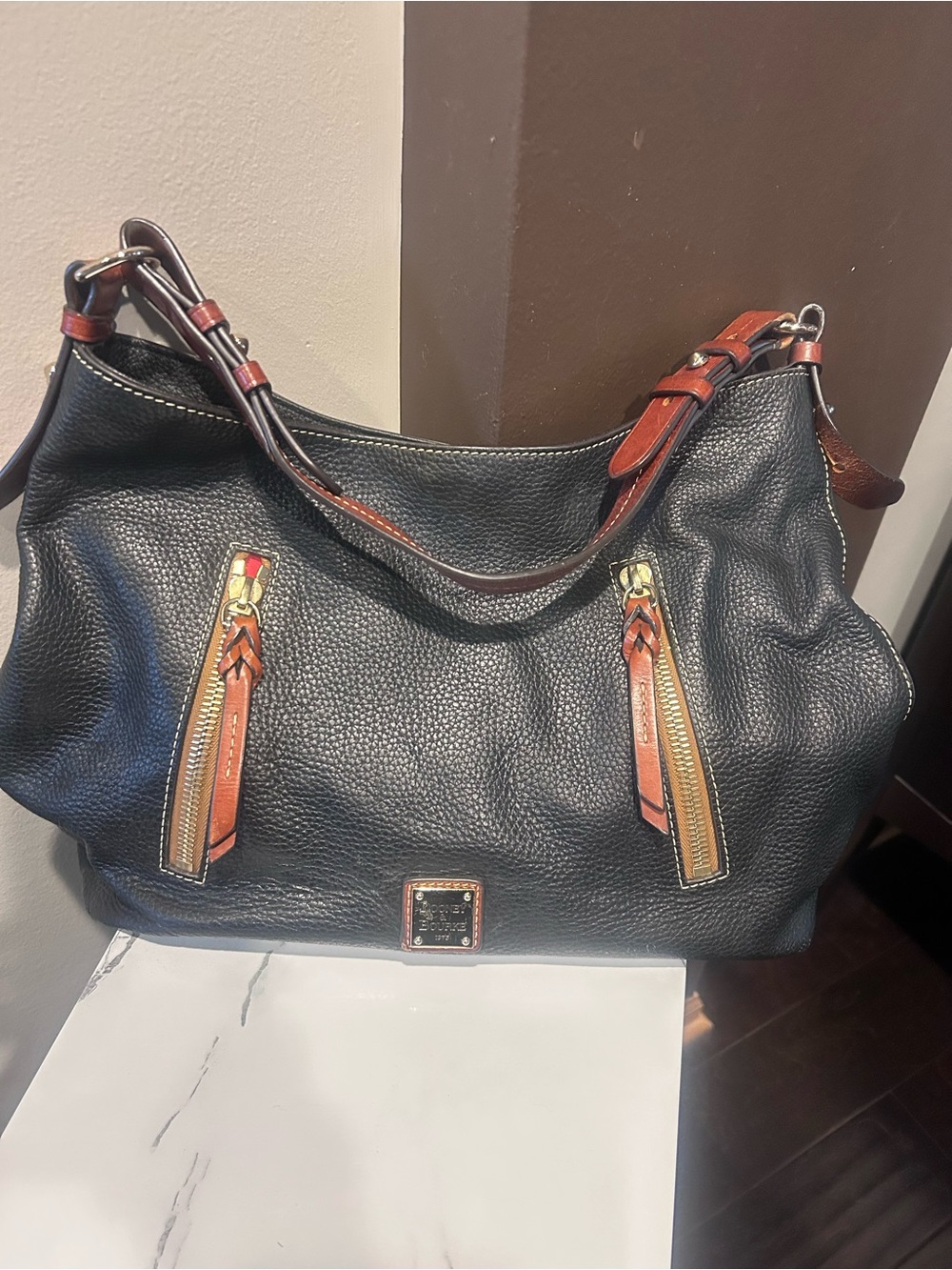 Dooney & Bourke Black Pebbled Leather Shoulder Bag with Brown Trim